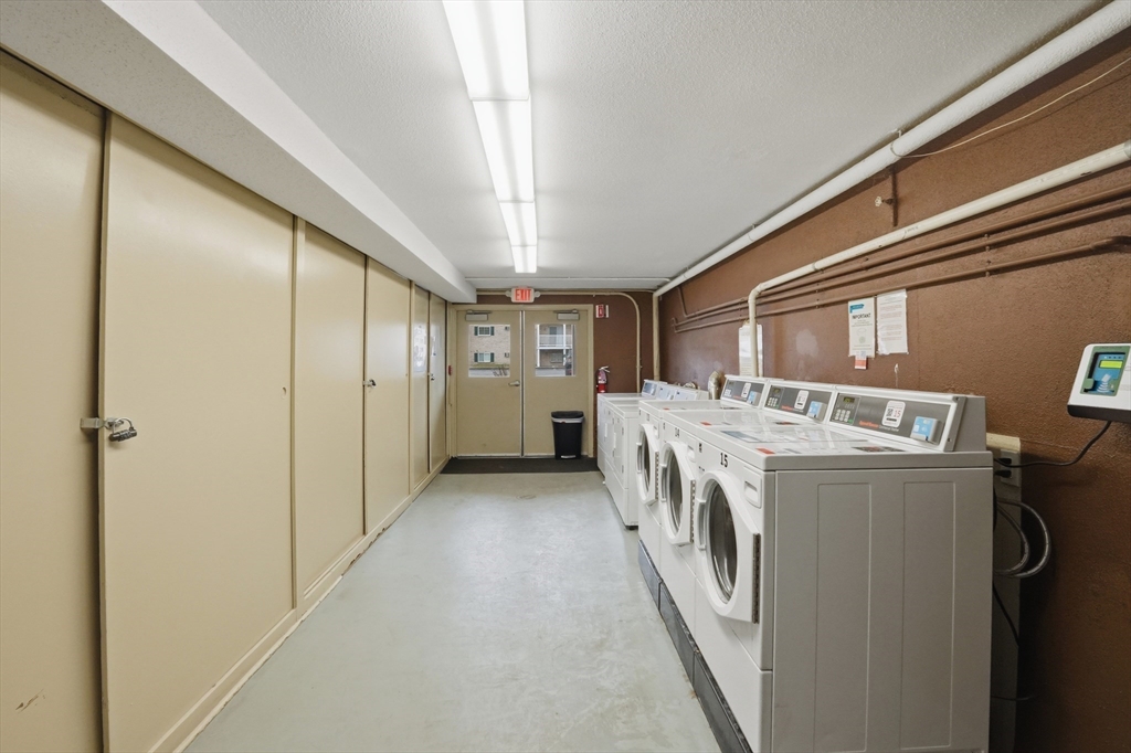 200 Manning Street, Unit 11C Hudson, MA 01749 - Photo 23 of 30 a utility room with dryer and washer