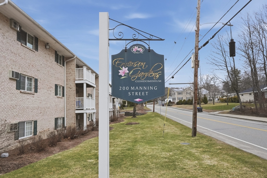 200 Manning Street, Unit 11C Hudson, MA 01749 - Photo 29 of 30 a view of a street with a building in the background
