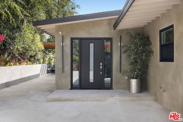 a front view of a house with a garage
