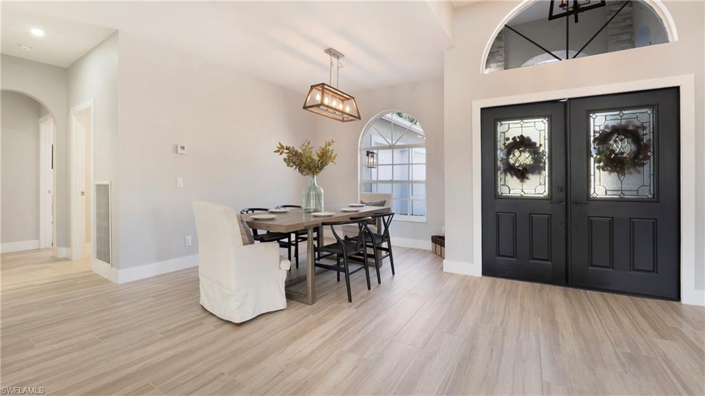 770 17th Street Southwest Naples, FL 34117 - Photo 7 of 47 a view of a dining room with furniture and window
