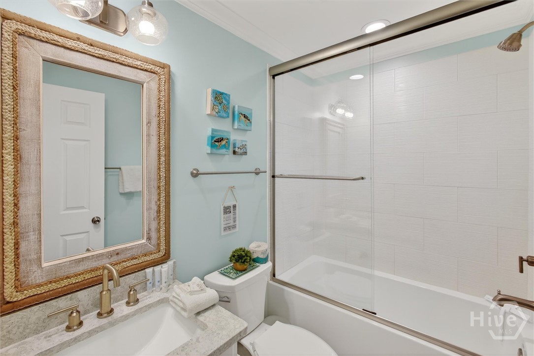 101 Butler Avenue, Unit G Tybee Island, GA 31328 - Photo 19 of 40 Guest bath on main floor