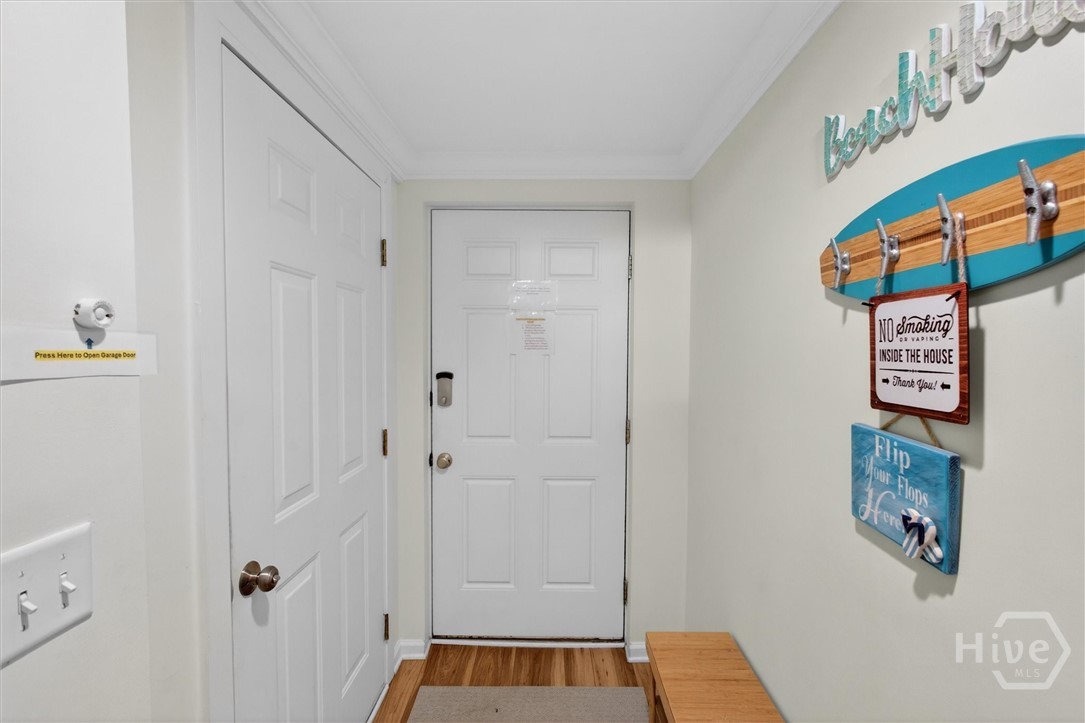 101 Butler Avenue, Unit G Tybee Island, GA 31328 - Photo 3 of 40 Entryway from parking lot