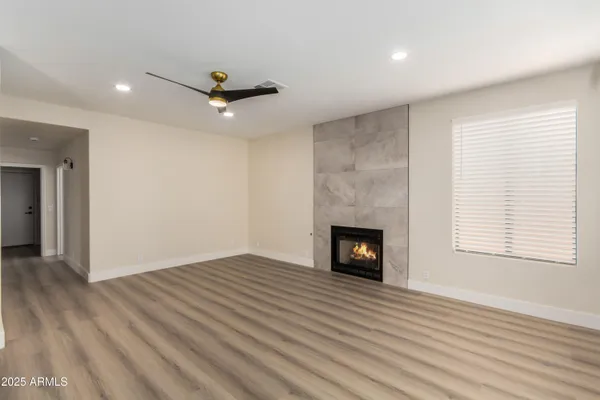 a kitchen with stainless steel appliances a sink stove refrigerator and cabinets