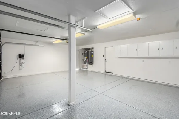 a view of a swimming pool with an outdoor seating