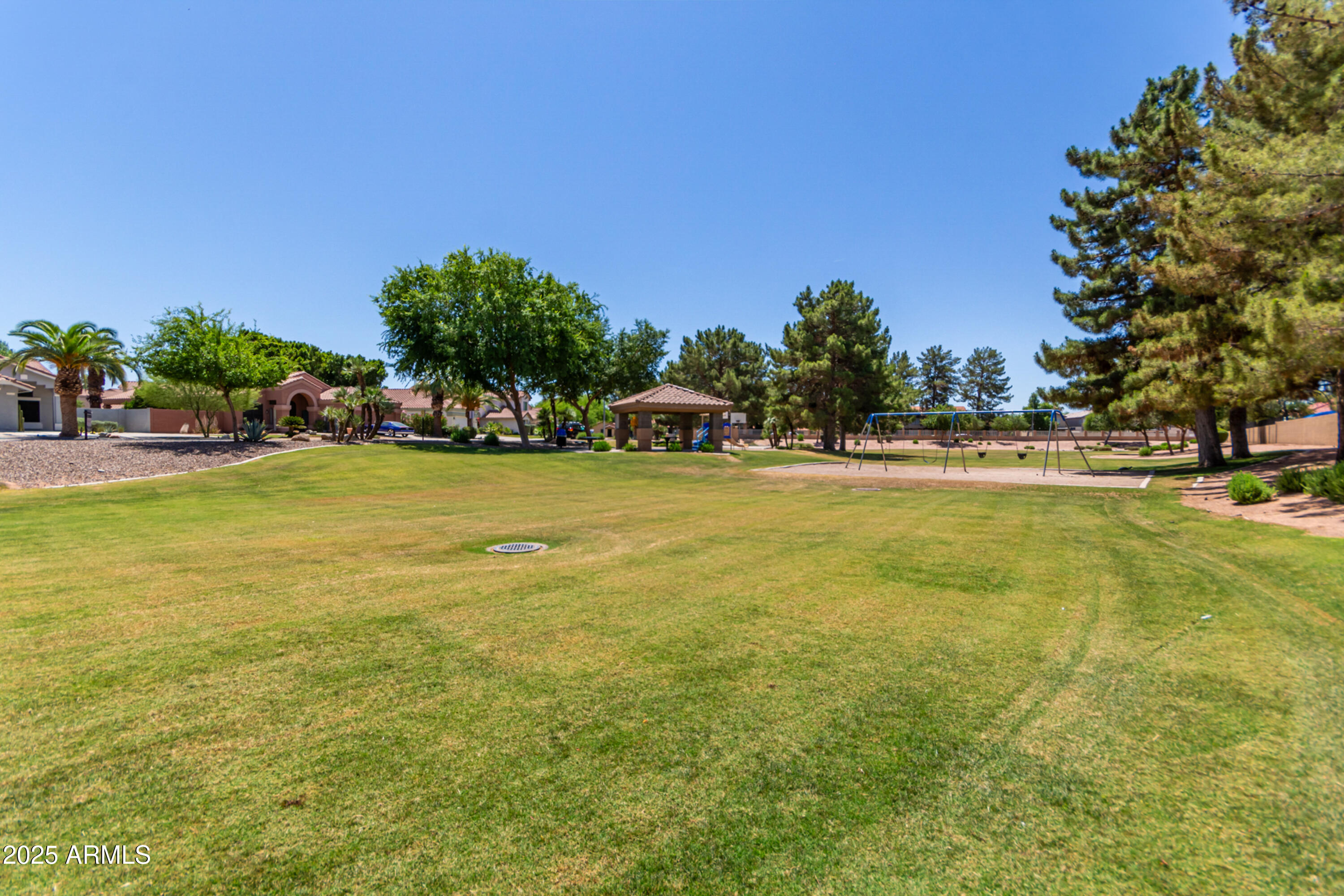 1630 South Lemon Mesa, AZ 85206 - Photo 54 of 55 a view of a swimming pool with an outdoor space and seating area