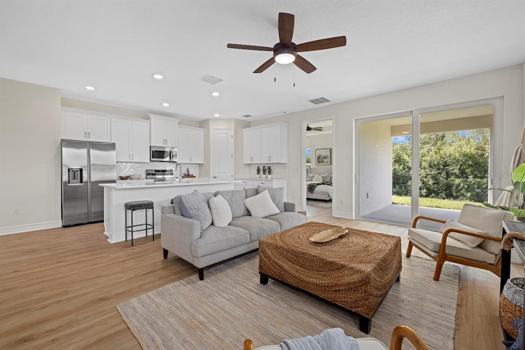 2575 Caladium Road North Port, FL 34288 - Photo 13 of 24 a living room with furniture and a large window