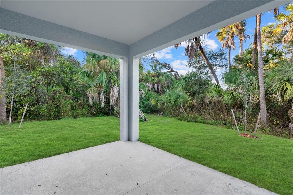 2575 Caladium Road North Port, FL 34288 - Photo 5 of 24 a view of a back yard from a big room