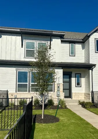 a front view of house with yard