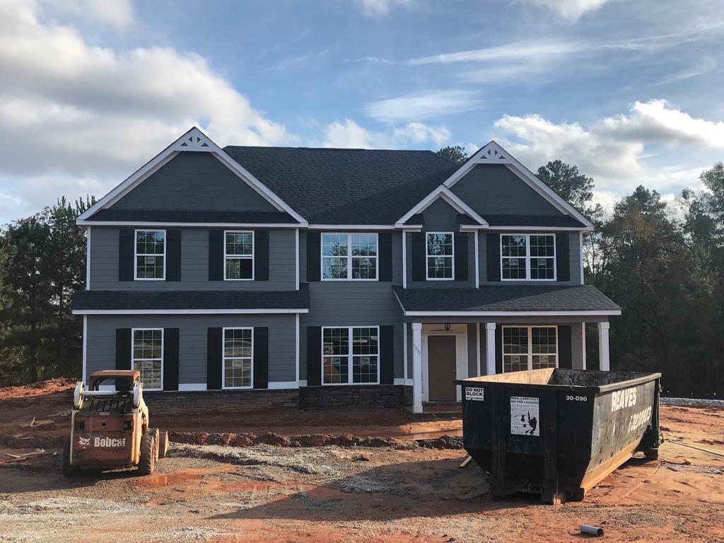 1935 Andrews Road Opelika, AL 36801 - Photo 1 of 3 a front view of a house with a yard