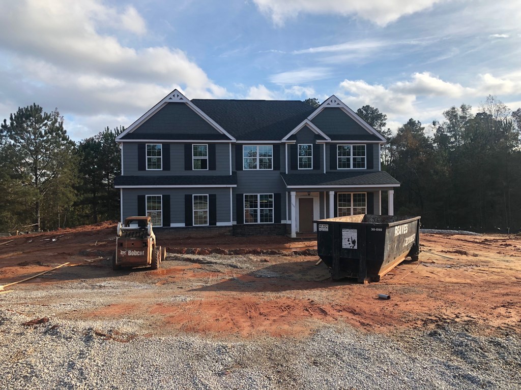 1935 Andrews Road Opelika, AL 36801 - Photo 3 of 3 a front view of a house with a yard