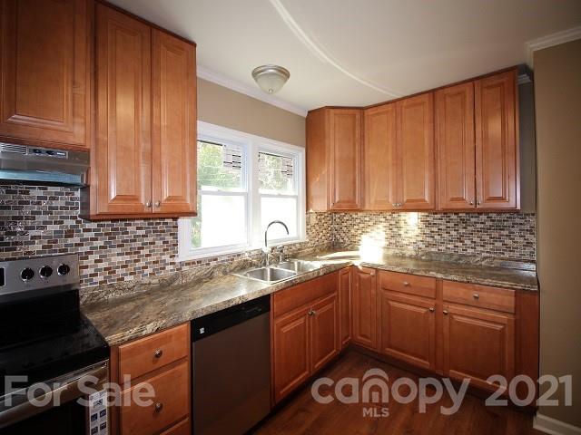 166 Cemetery Street Chester, SC 29706 - Photo 10 of 28 a kitchen with a sink cabinets and window