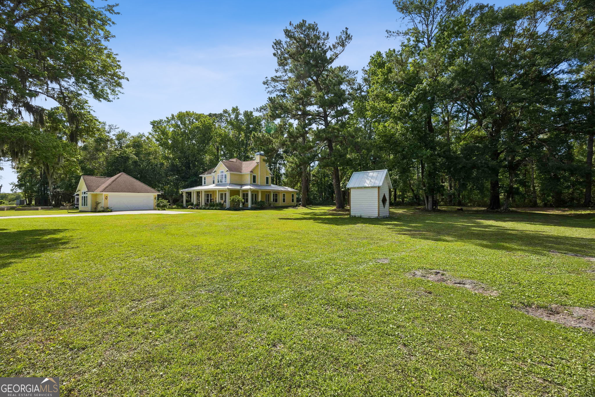 706 Hopewell Point Road White Oak, GA 31568 - Photo 75 of 84 A wide-open backyard provides room to roam while maintaining the privacy and serenity of this beautiful wooded homesite.