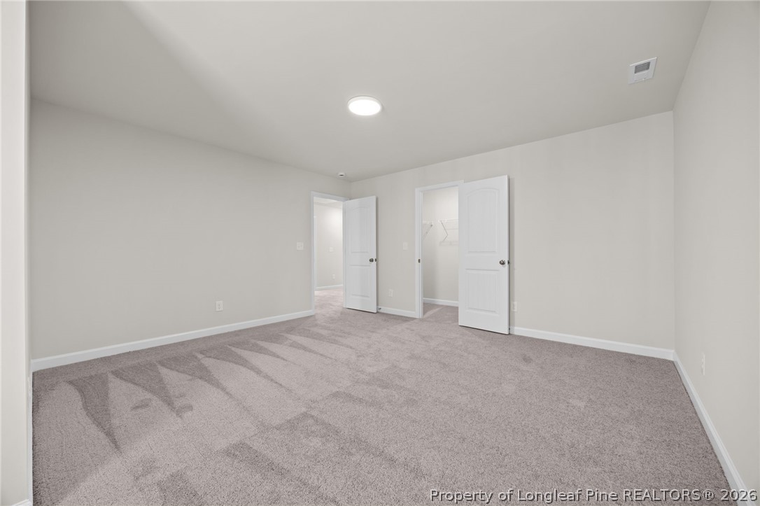 147 Michter Street Vass, NC 28394 - Photo 19 of 48 an empty room with an entryway