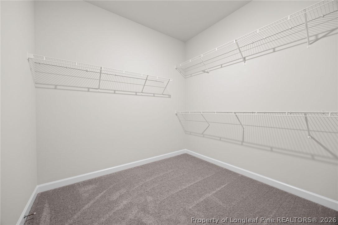 147 Michter Street Vass, NC 28394 - Photo 33 of 48 a view of a room with racks on the wall