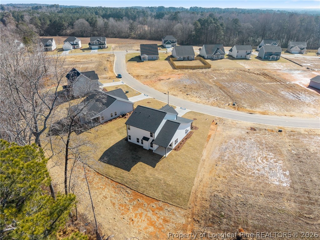 147 Michter Street Vass, NC 28394 - Photo 6 of 48 a view of the terrace with seating space
