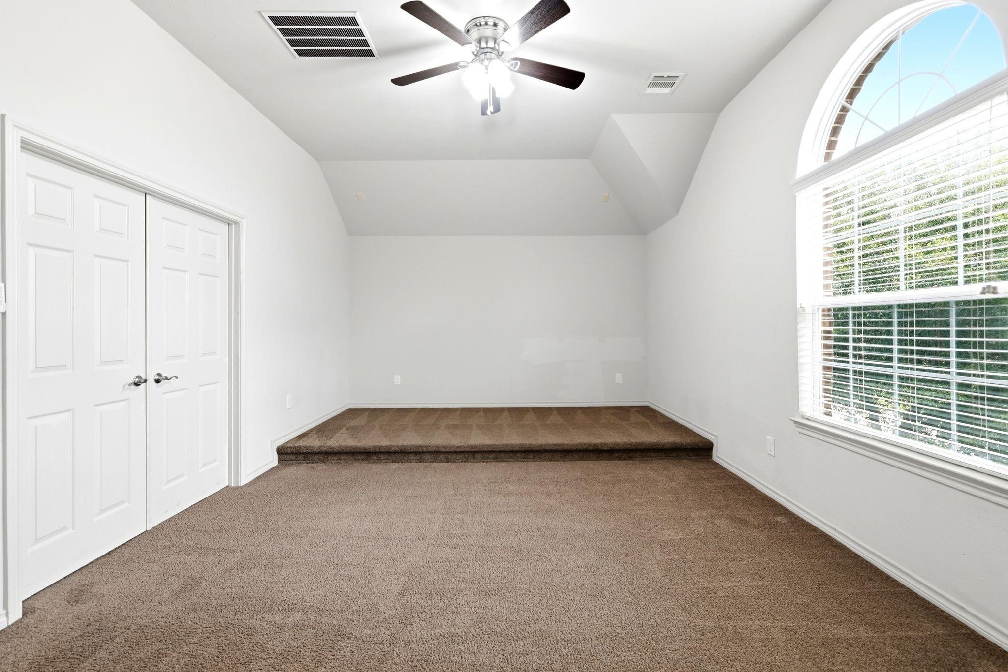19903 Senterra Lakes Boulevard Spring, TX 77379 - Photo 34 of 50 Spacious media room with vaulted ceilings.