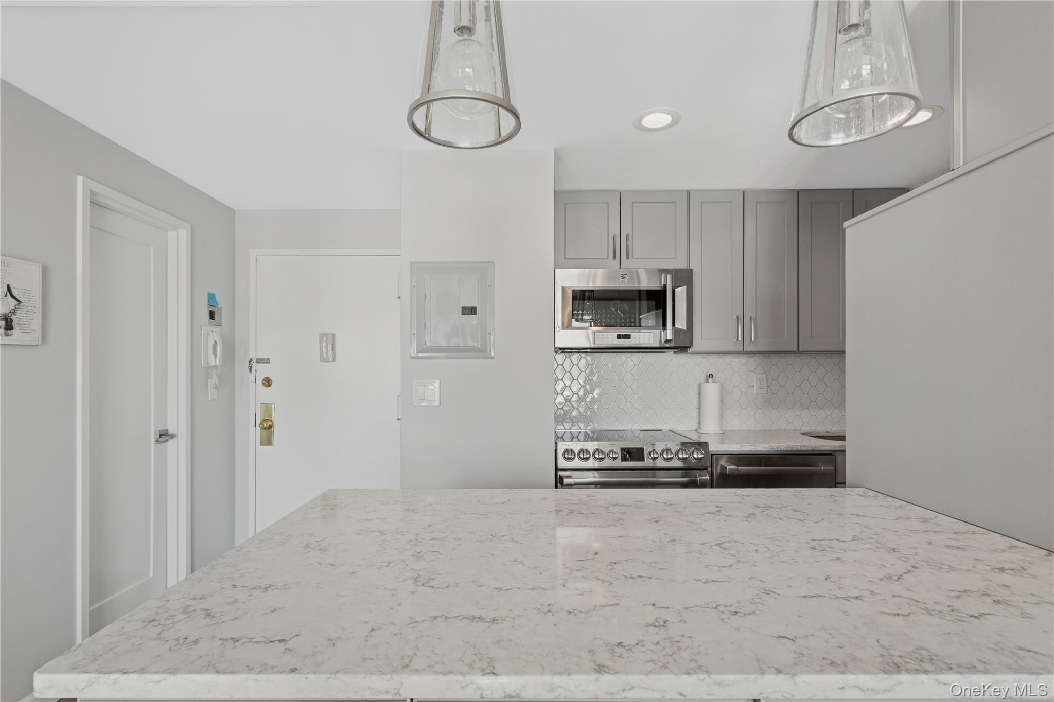 2 Richmond Road, Unit 3A Lido Beach, NY 11561 - Photo 14 of 33 a view of a kitchen with a sink and a window