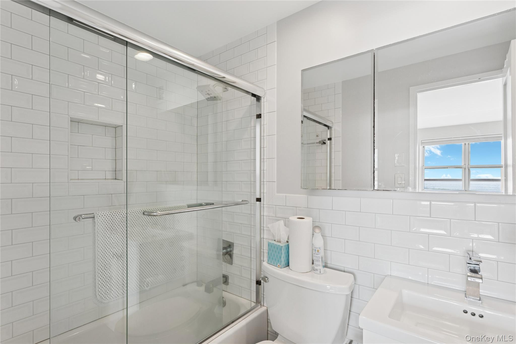 2 Richmond Road, Unit 3A Lido Beach, NY 11561 - Photo 22 of 33 a bathroom with a shower and a toilet