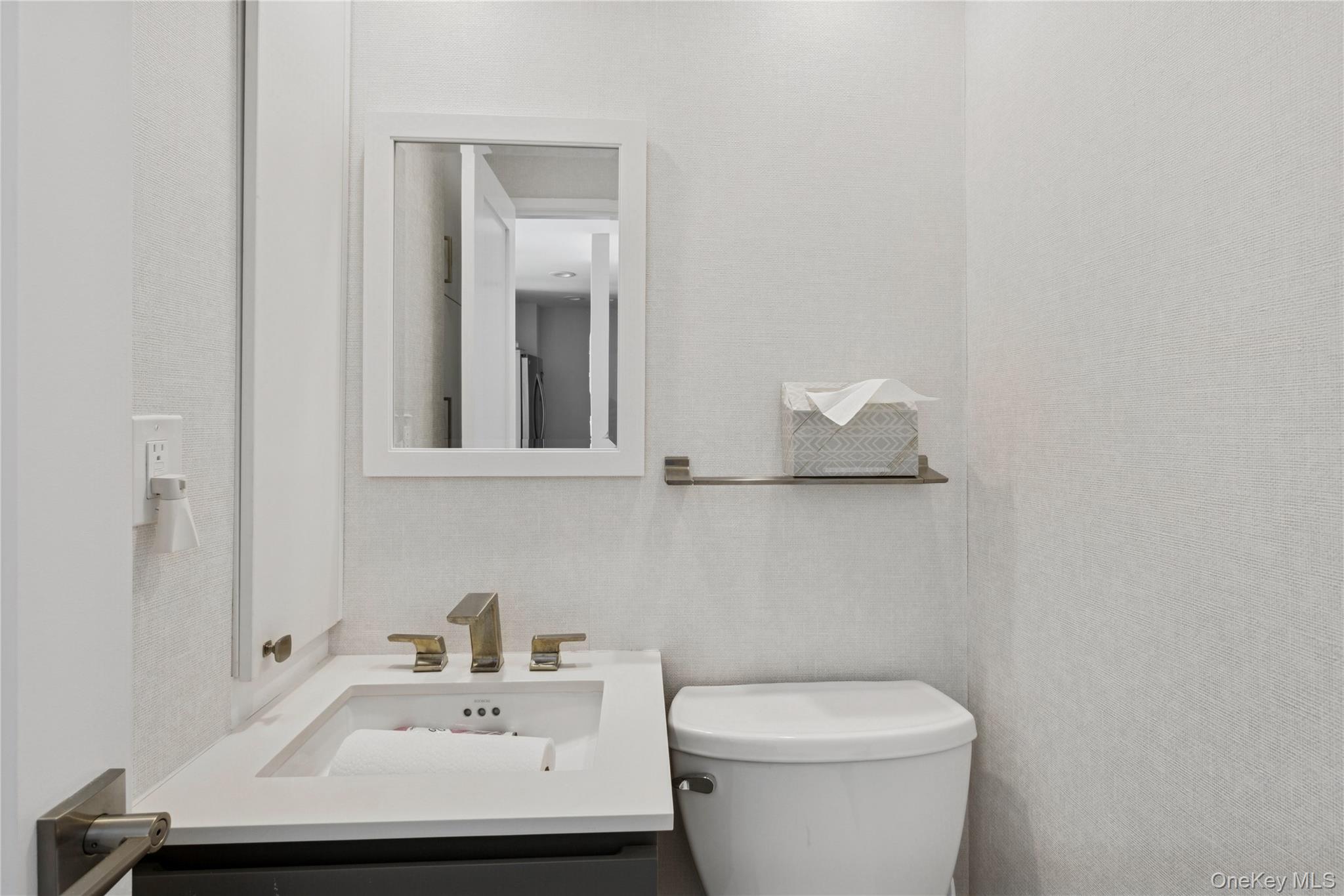 2 Richmond Road, Unit 3A Lido Beach, NY 11561 - Photo 23 of 33 a bathroom with a sink and a toilet