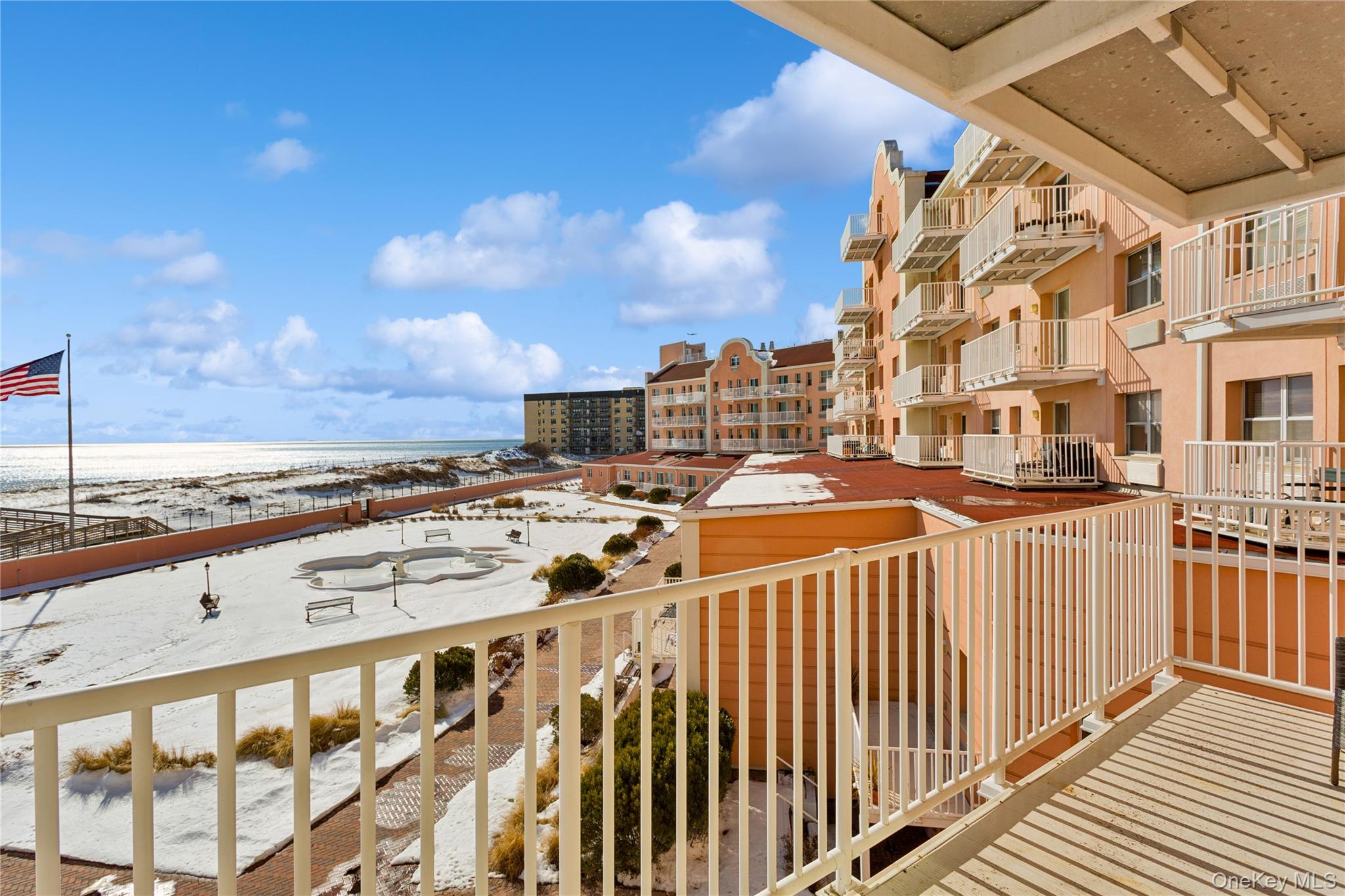2 Richmond Road, Unit 3A Lido Beach, NY 11561 - Photo 26 of 33 a view of a balcony with an outdoor seating