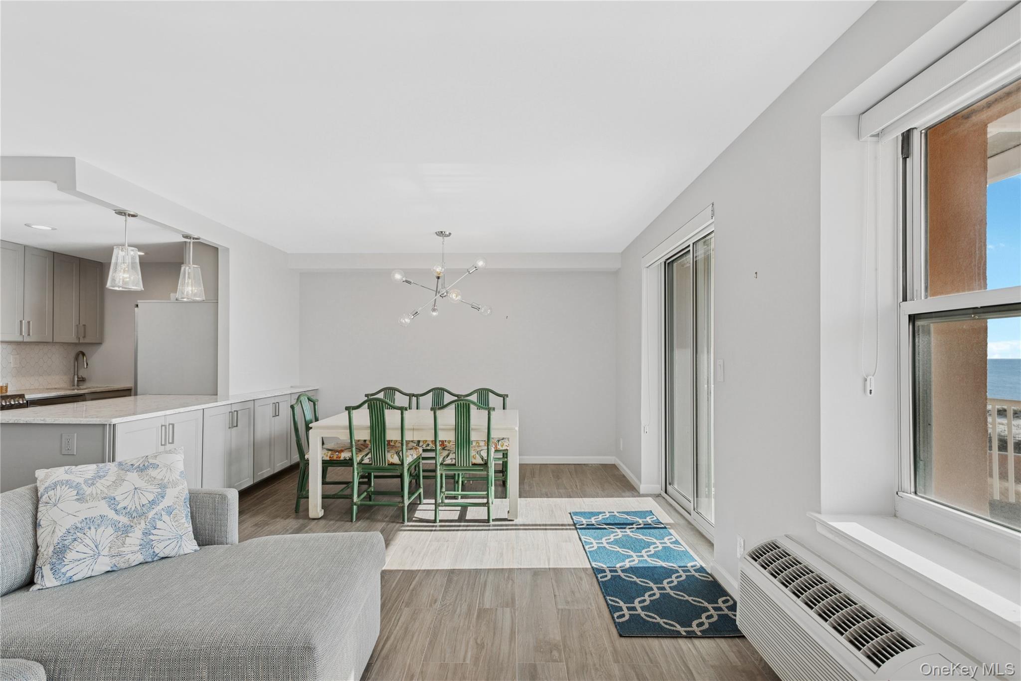 2 Richmond Road, Unit 3A Lido Beach, NY 11561 - Photo 6 of 33 a living room with furniture and a wooden floor