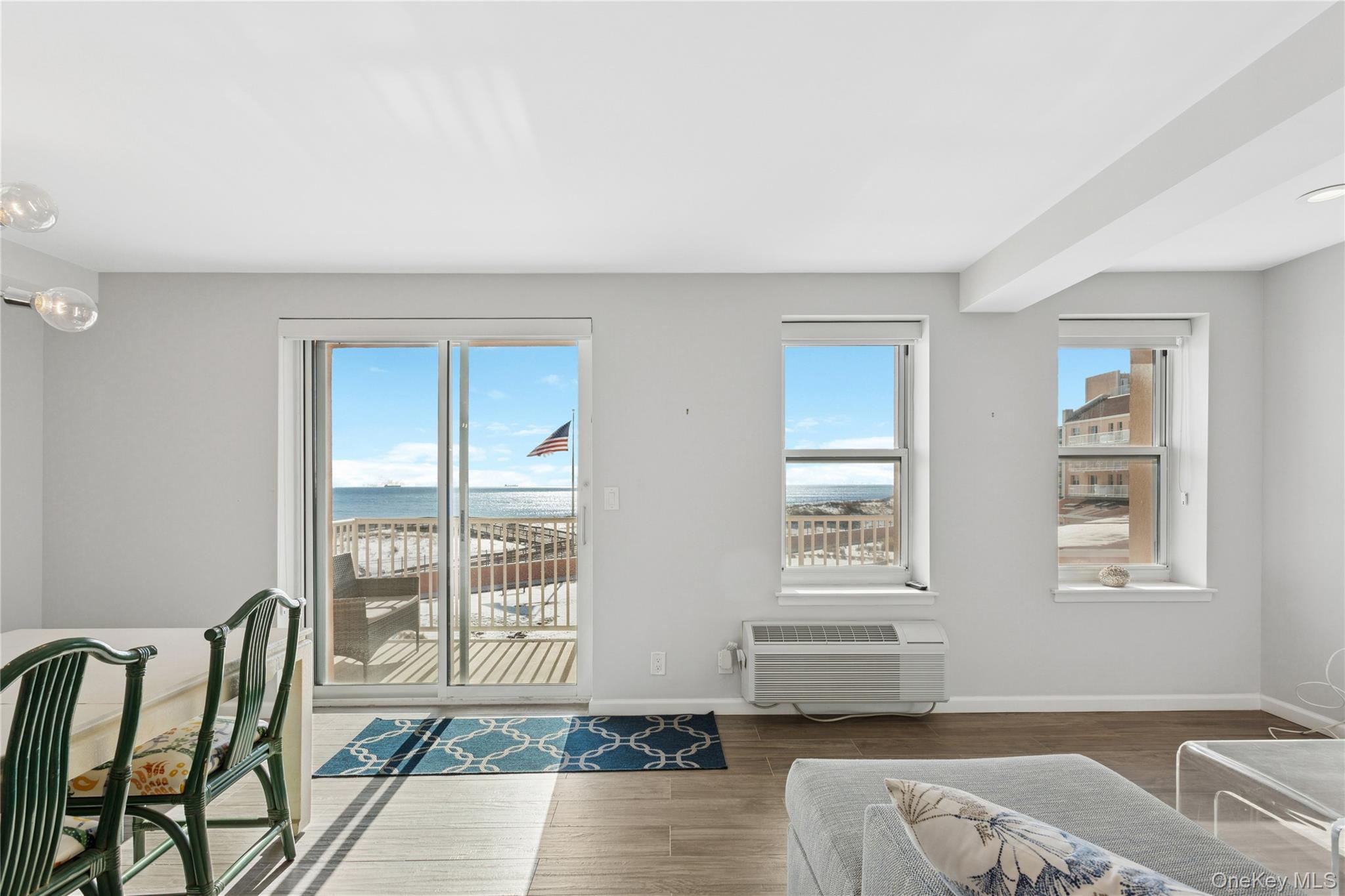 2 Richmond Road, Unit 3A Lido Beach, NY 11561 - Photo 7 of 33 a living room with furniture and two window