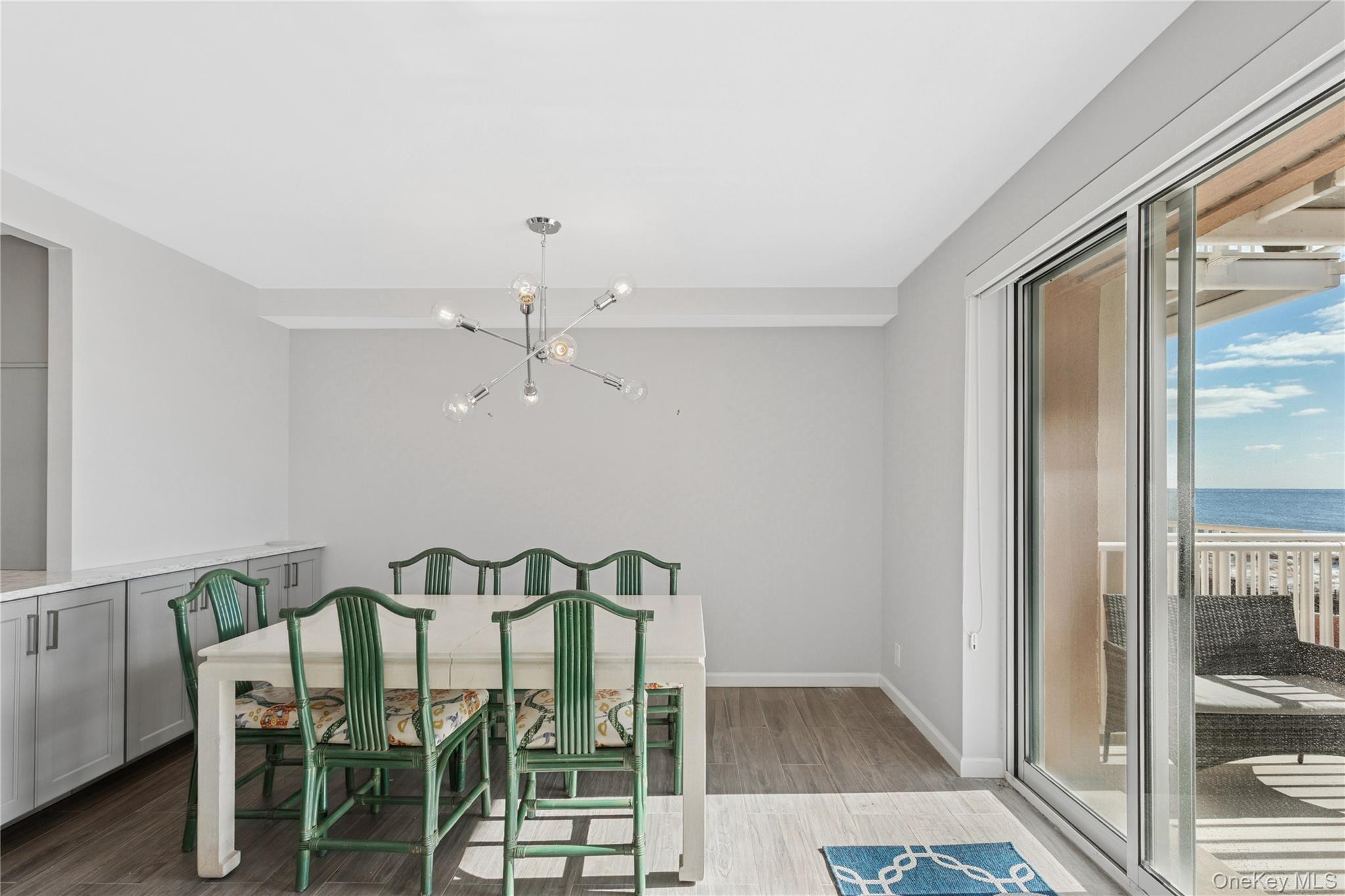 2 Richmond Road, Unit 3A Lido Beach, NY 11561 - Photo 8 of 33 a view of a dining room with furniture