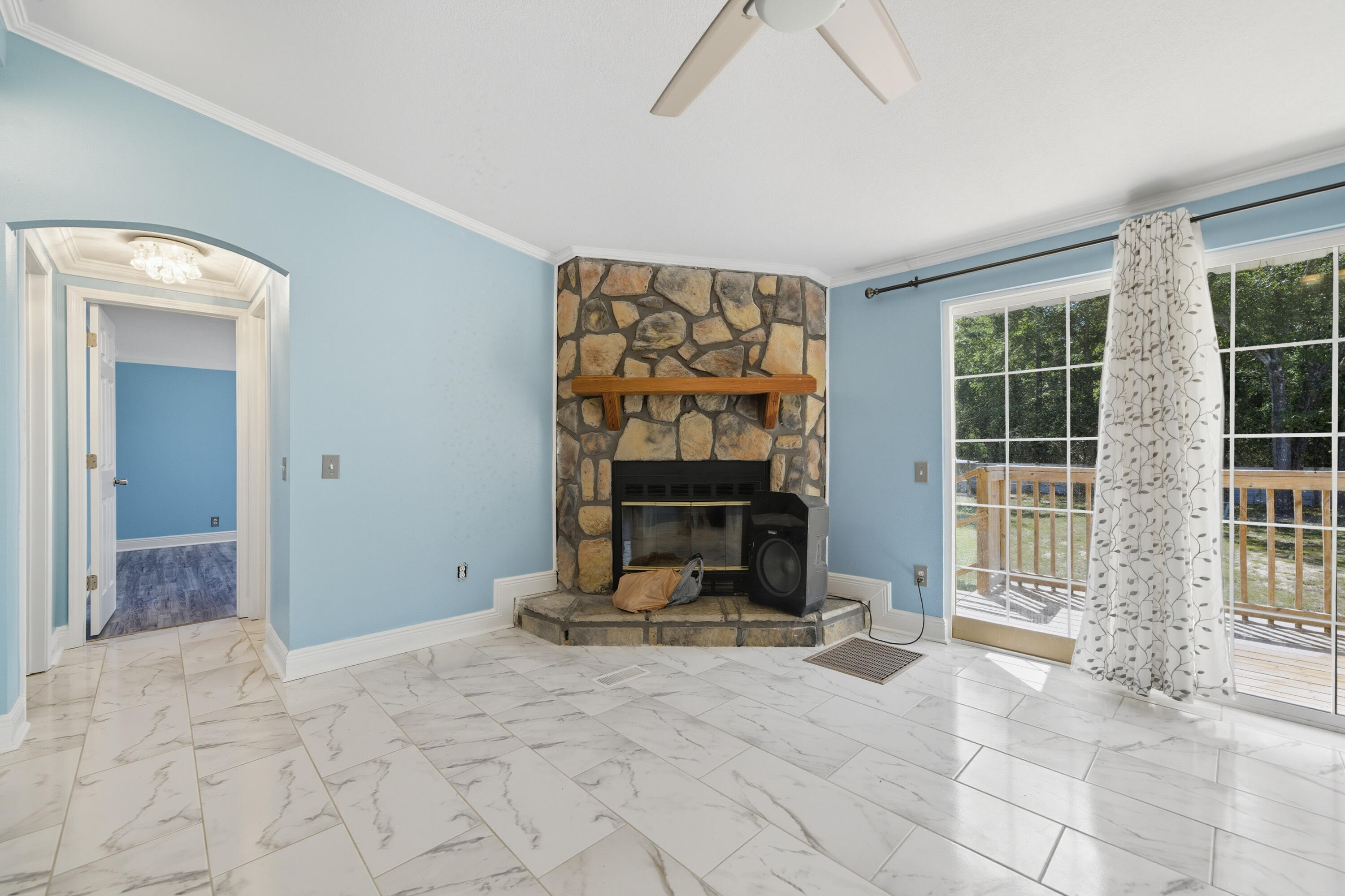 714 East Picasso Road DeFuniak Springs, FL 32433 - Photo 4 of 25 a view of an empty room with a window