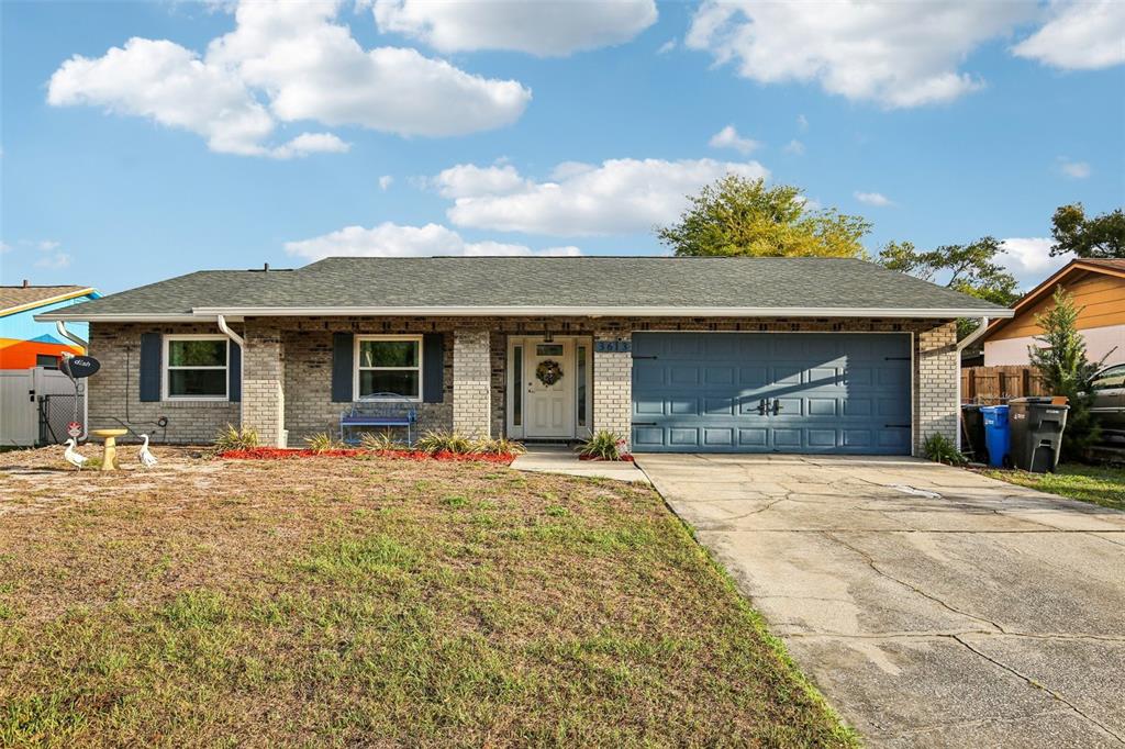 3613 Coppertree Circle Brandon, FL 33511 - Photo 1 of 51 a front view of a house with a garden
