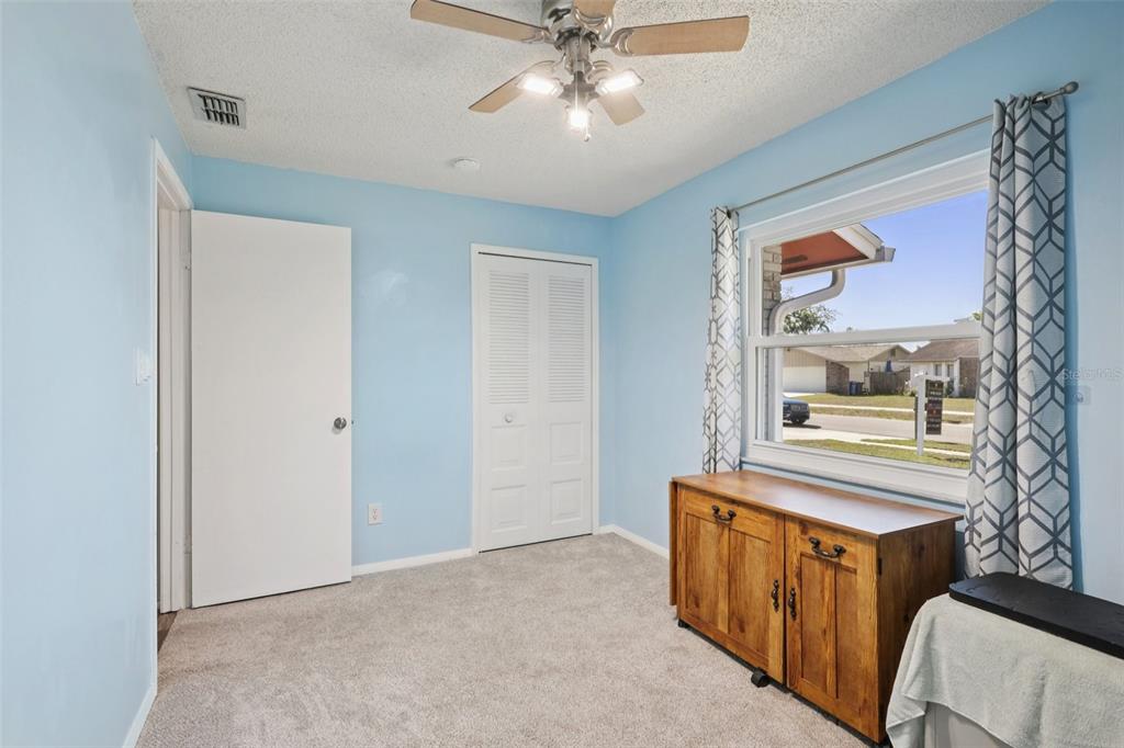 3613 Coppertree Circle Brandon, FL 33511 - Photo 19 of 51 a view of a hallway with paintings on the wall