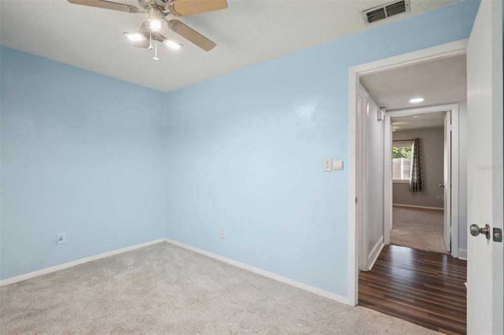 3613 Coppertree Circle Brandon, FL 33511 - Photo 21 of 51 wooden floor in an empty room and a gallery