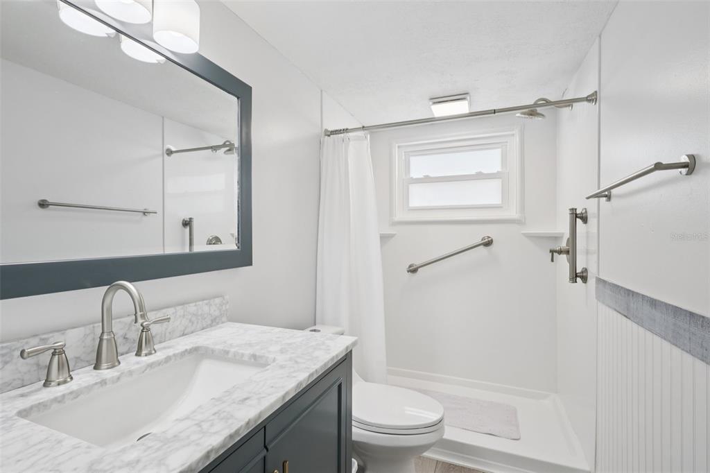 3613 Coppertree Circle Brandon, FL 33511 - Photo 23 of 51 a bathroom with a granite countertop sink toilet and shower
