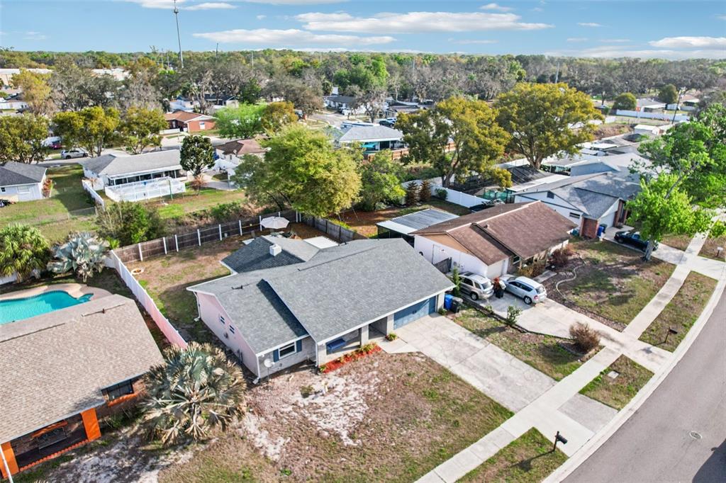 3613 Coppertree Circle Brandon, FL 33511 - Photo 42 of 51 an aerial view of residential houses with outdoor space and parking