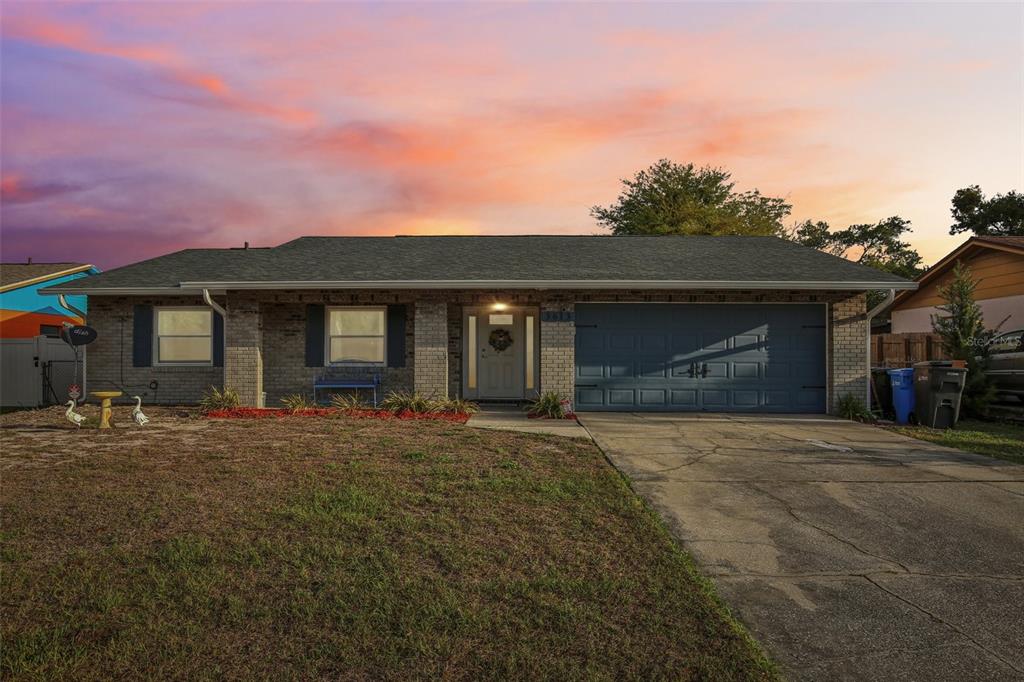 3613 Coppertree Circle Brandon, FL 33511 - Photo 50 of 51 a front view of a house with a garden