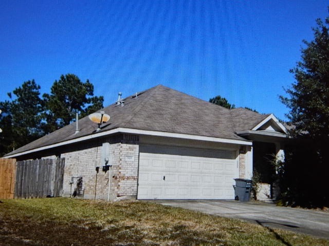 3019 Ivory Forest Lane Spring, TX 77386 - Photo 2 of 6 a front view of a house with a yard