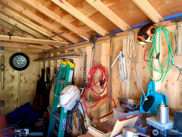 a view of a lake with houses in the back