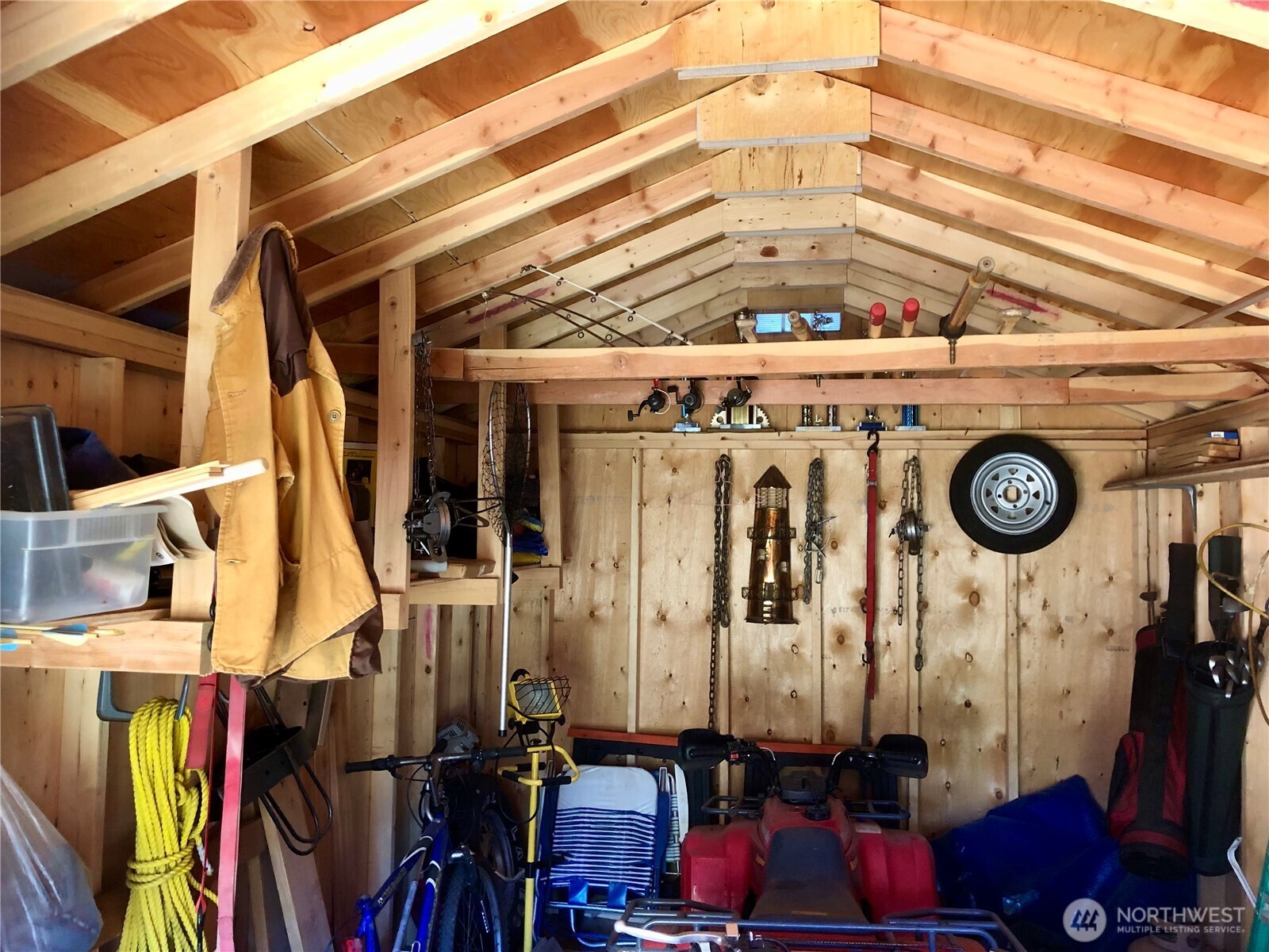 11300 South Stangland Road Medical Lake, WA 99022 - Photo 13 of 27 a view of a hallway with wooden walls
