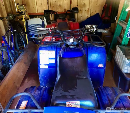 a view of a yard with large trees