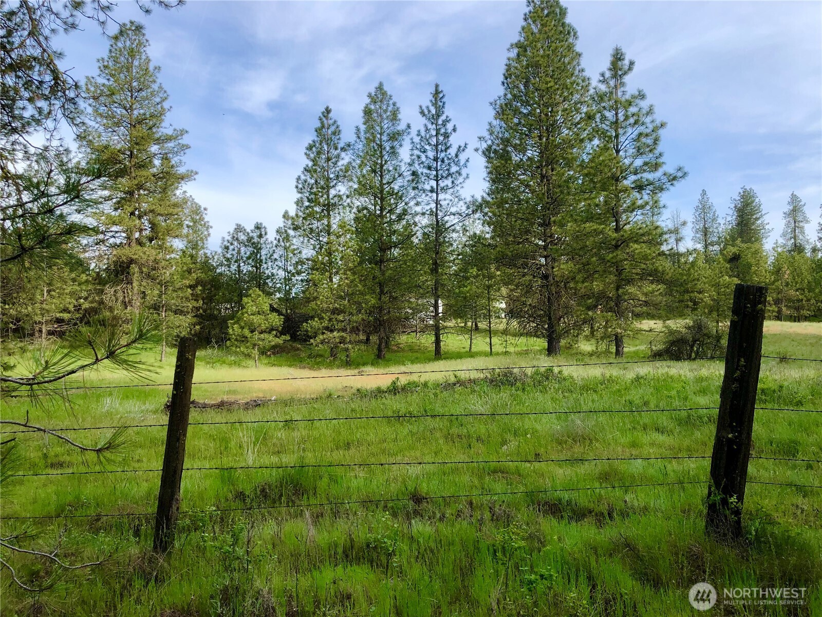 11300 South Stangland Road Medical Lake, WA 99022 - Photo 5 of 27 a view of an outdoor space with a lake view