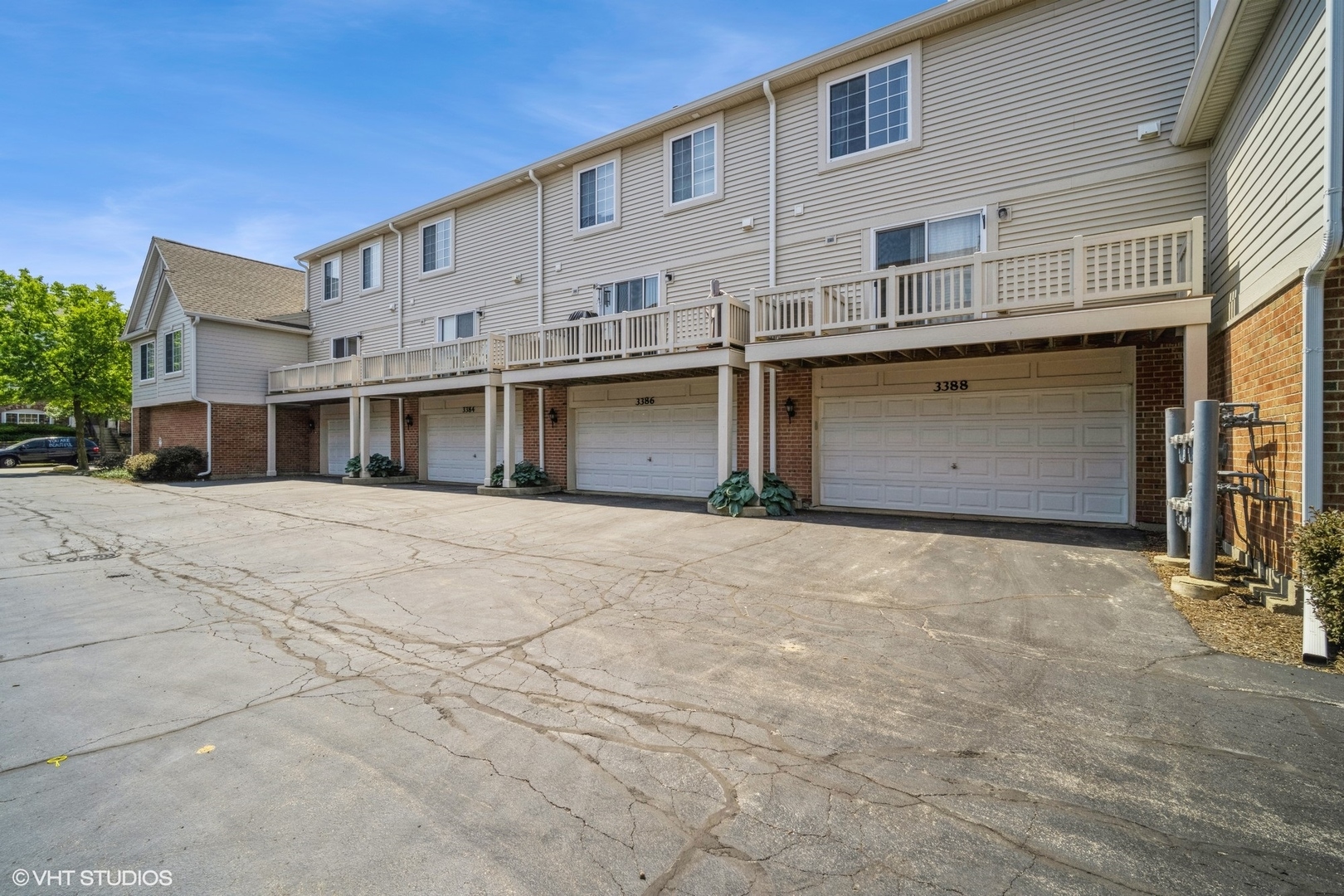 3388 Sanctuary Drive Elgin, IL 60124 - Photo 15 of 15 a front view of a house with a yard and garage