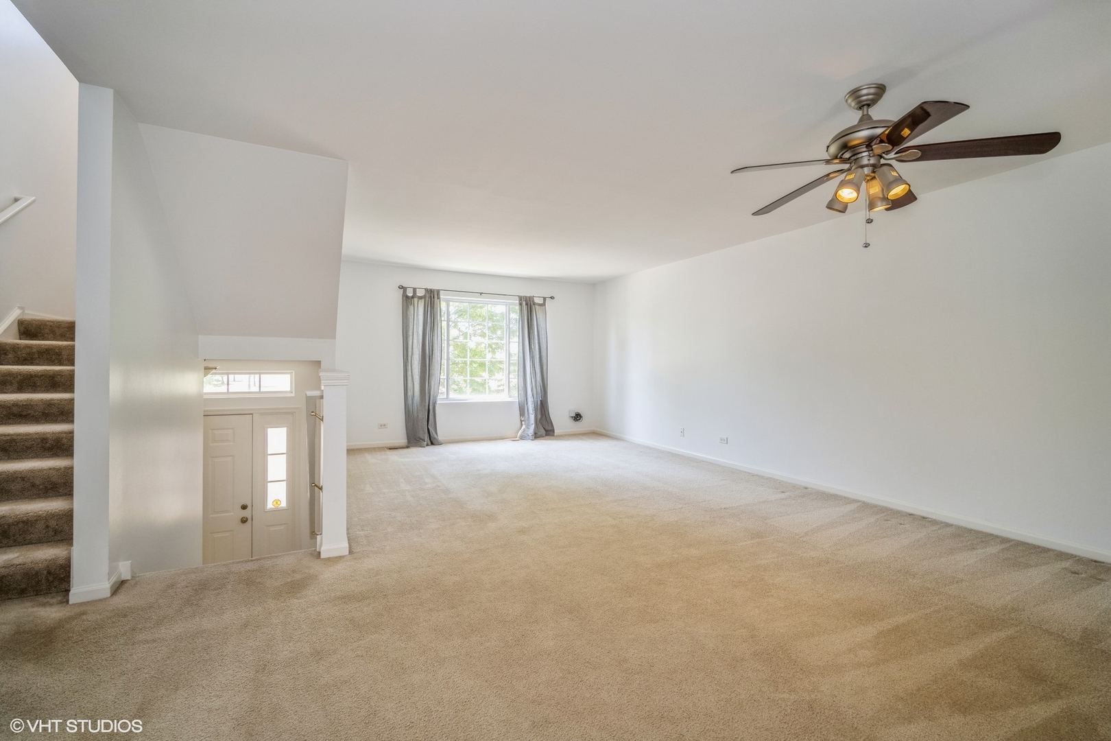 3388 Sanctuary Drive Elgin, IL 60124 - Photo 2 of 15 a view of empty room with a window