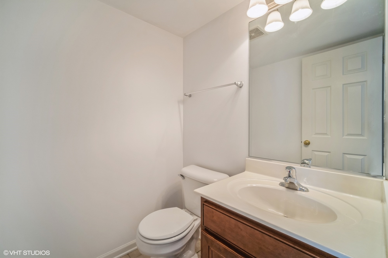 3388 Sanctuary Drive Elgin, IL 60124 - Photo 6 of 15 a bathroom with a sink a toilet and vanity