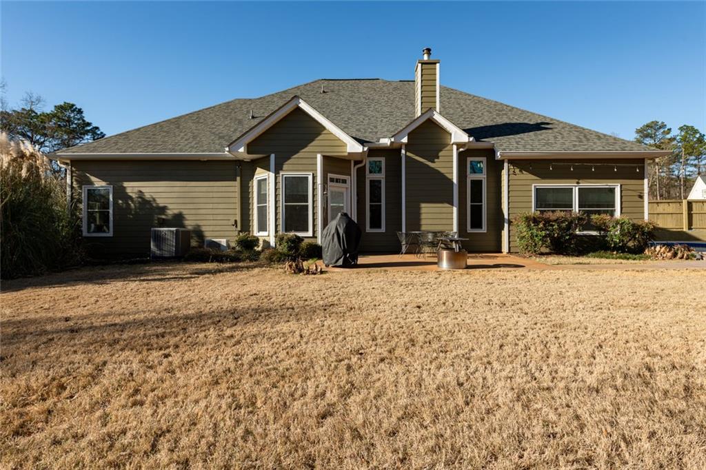 8620 Copperridge Drive Winston, GA 30187 - Photo 15 of 45 a front view of a house with a yard