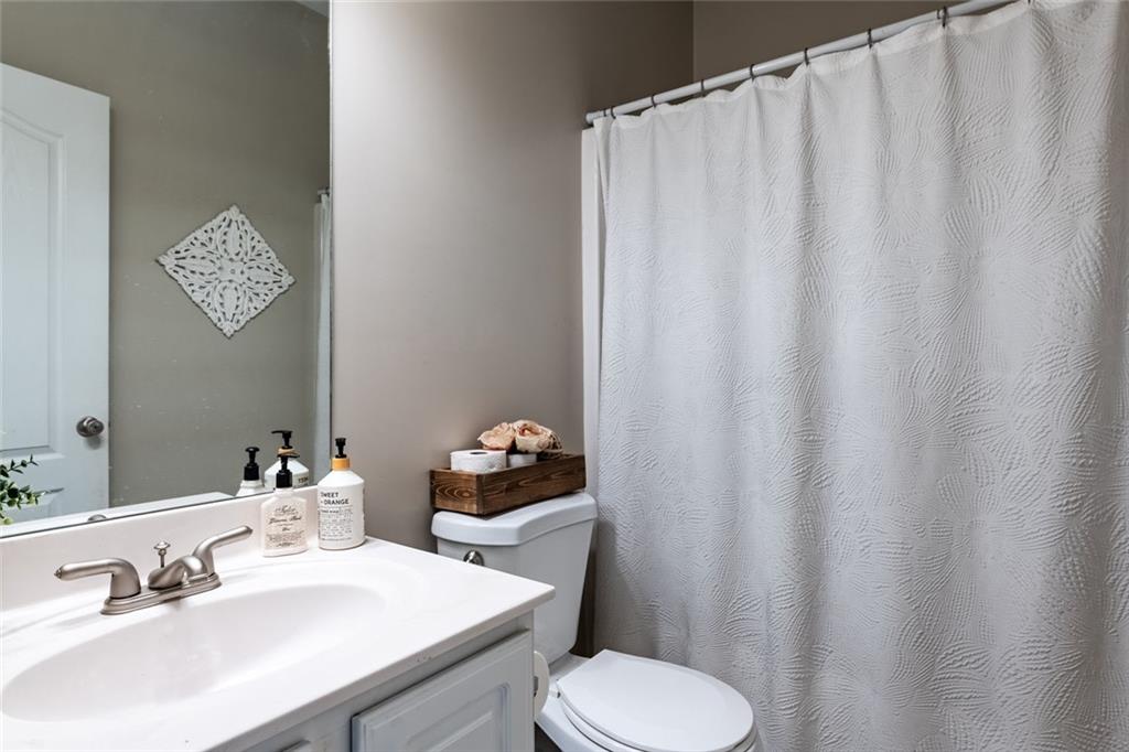 8620 Copperridge Drive Winston, GA 30187 - Photo 39 of 45 a bathroom with a sink and a mirror