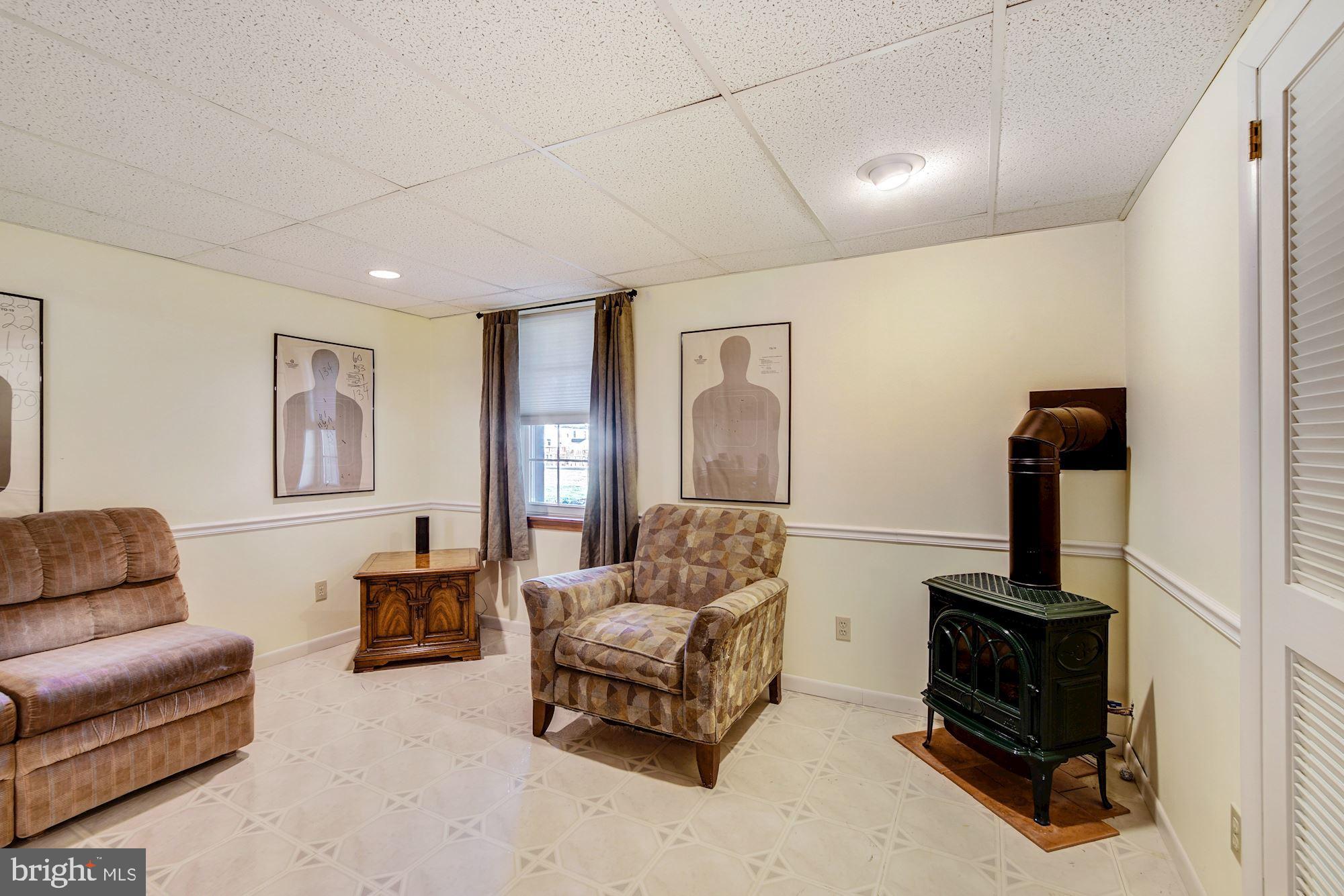 353 Scola Road Brookhaven, PA 19015 - Photo 25 of 26 Partially Finished Bsmt w/ Wood Stove (N.Gas)