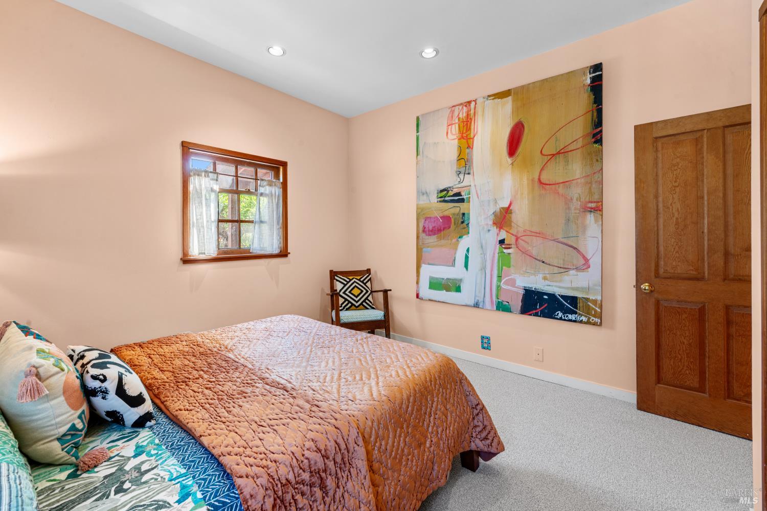 309 Hendley Street Santa Rosa, CA 95404 - Photo 19 of 31 a bedroom with a bed and a painting on the wall