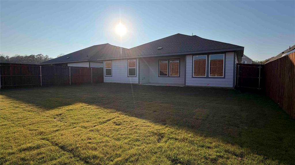 1550 Brooke Drive Tyler, TX 75704 - Photo 11 of 17 a view of a house with a yard