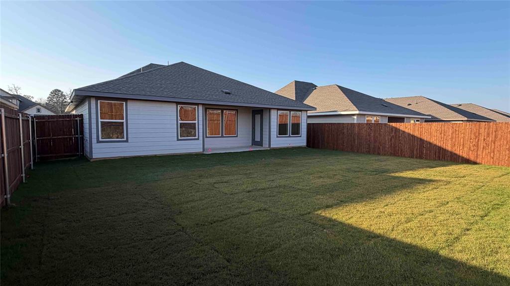 1550 Brooke Drive Tyler, TX 75704 - Photo 12 of 17 a front view of a house with garden