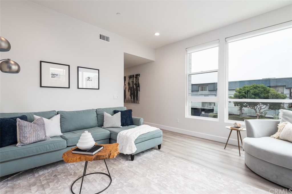 201 Elm Avenue Long Beach, CA 90802 - Photo 7 of 23 a living room with furniture and a window