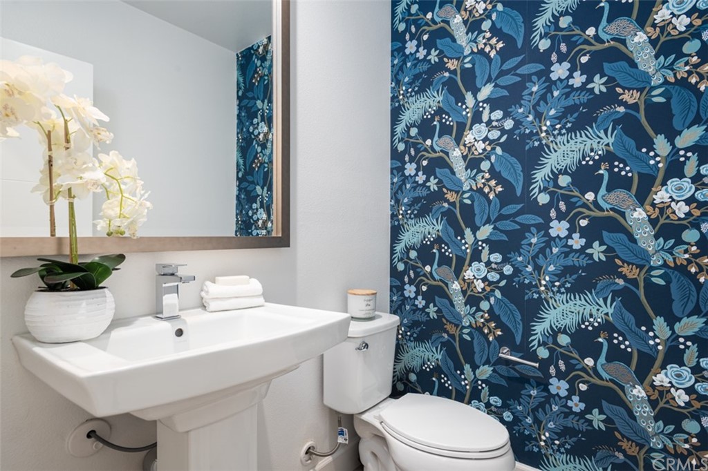 201 Elm Avenue Long Beach, CA 90802 - Photo 8 of 23 a bathroom with a sink mirror and toilet